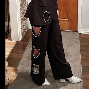 Black rhinestone heart cut out dress pants
